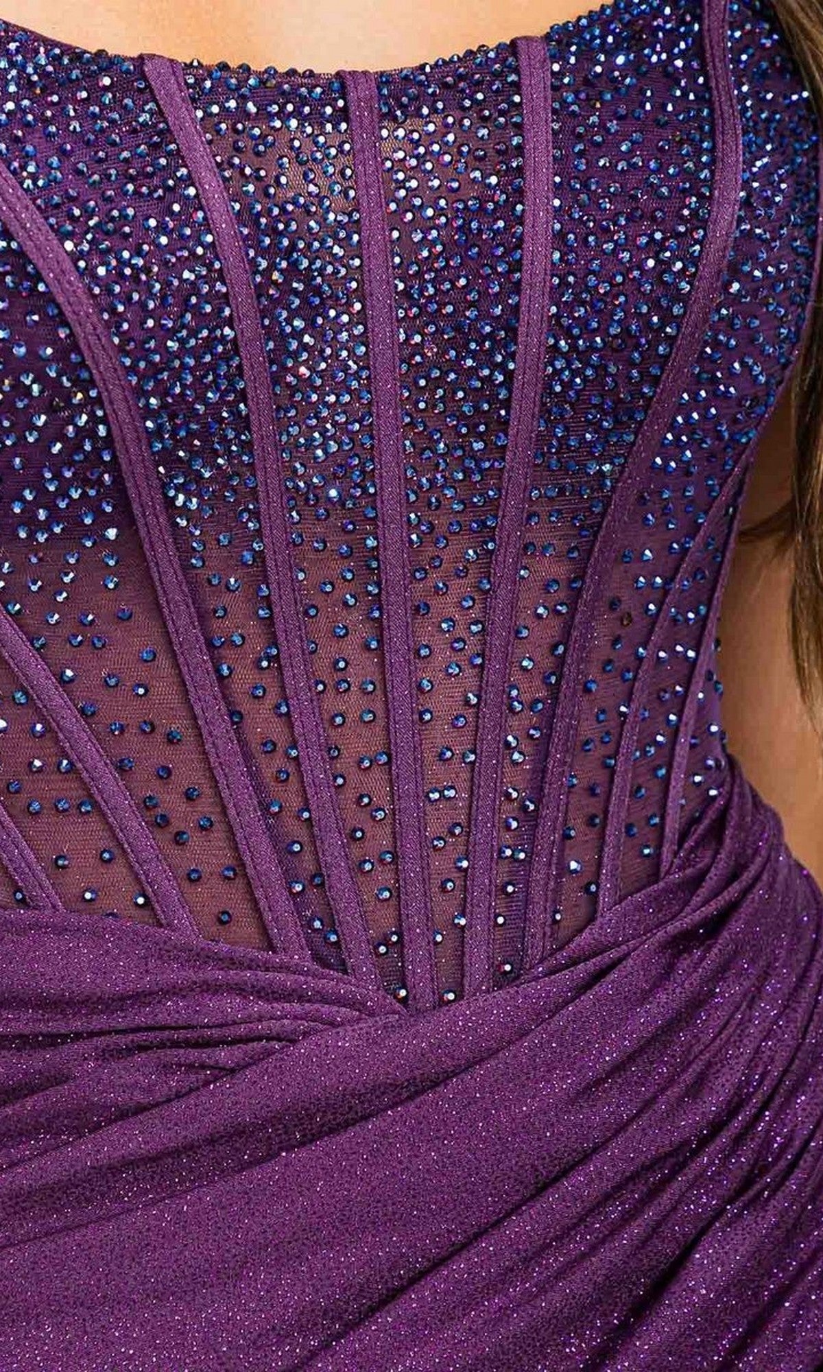Close-up of the Short Homecoming Dress: Eureka EK162, a purple, strapless glitter dress adorned with sparkling blue rhinestones and sheer panels for an elegant look.